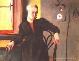 Femme assise près de la fenêtre Femme assise près de la fenêtre