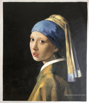 La fille avec une boucle d'oreille perle